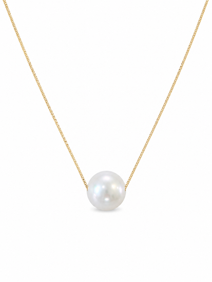 Pearl necklace on a gold chain against a white background