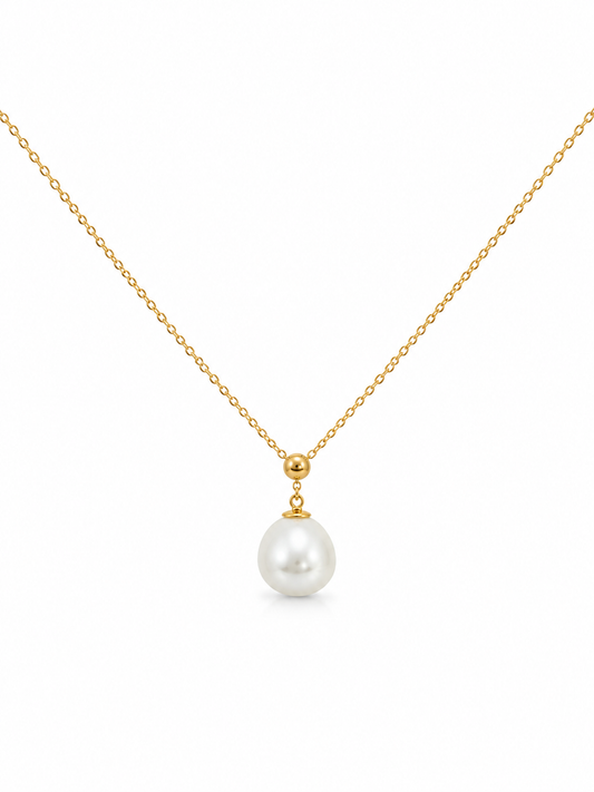 Gold necklace with a white pearl pendant on a white background