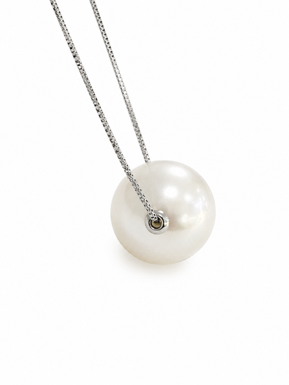Pearl necklace with a silver chain on a white background